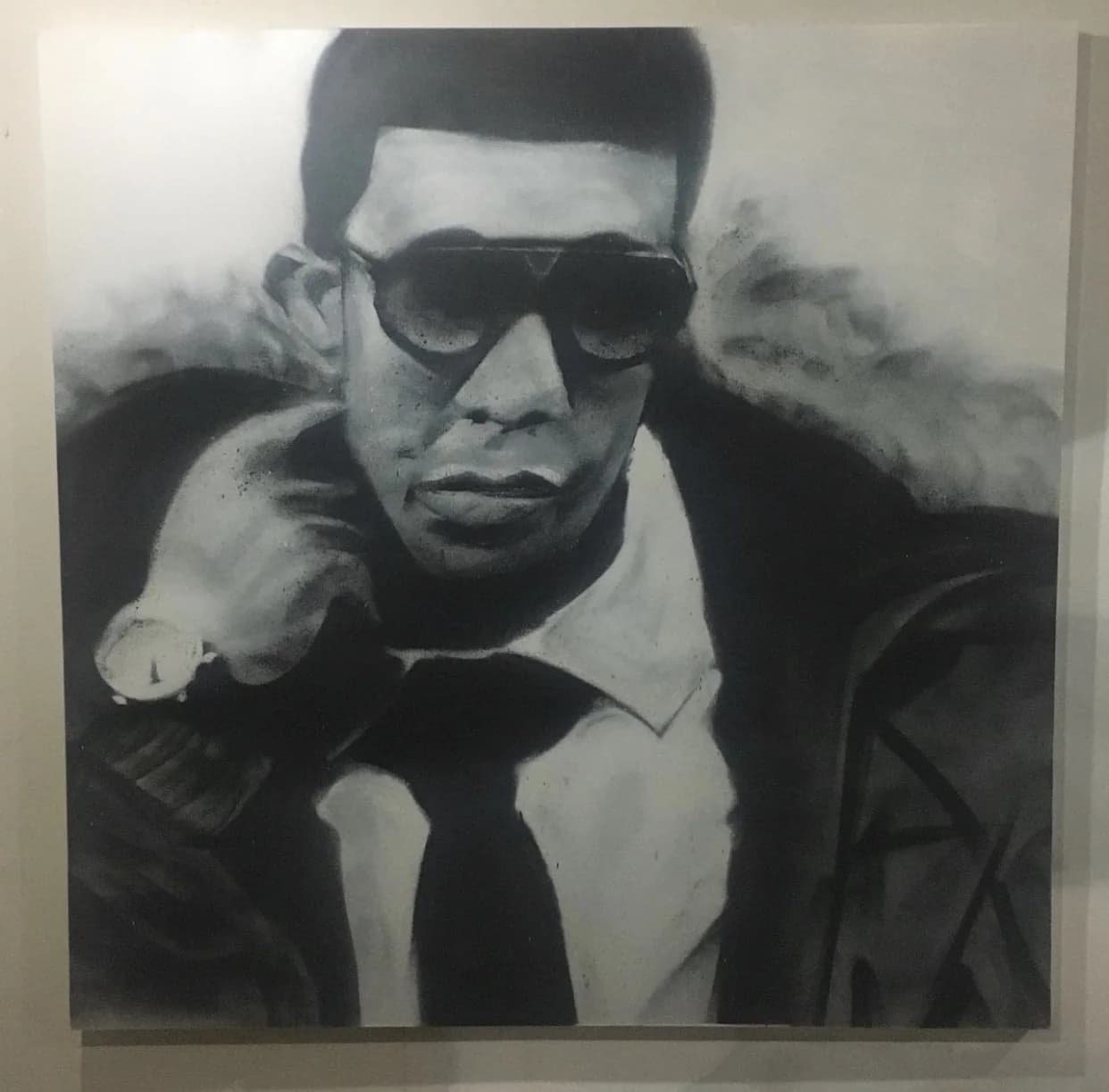 Monochrome spray-paint portrait of Drake on canvas by Quinton Trott